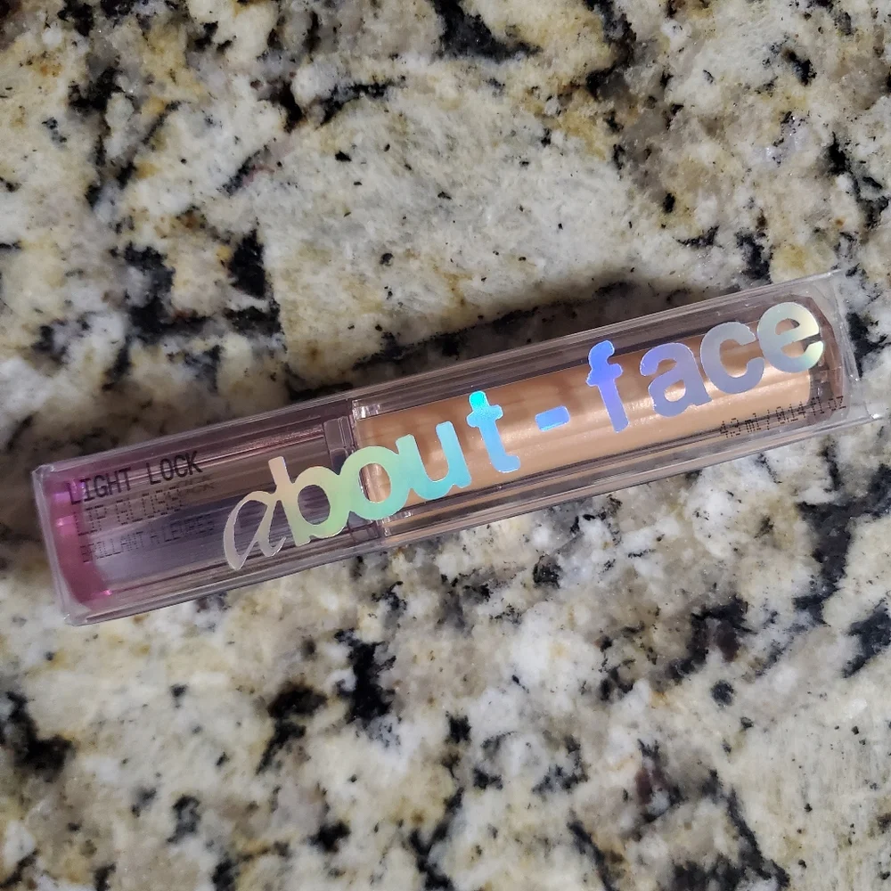 About FACE Such Great Heights Lip Gloss - Shimmering Peach Pearl